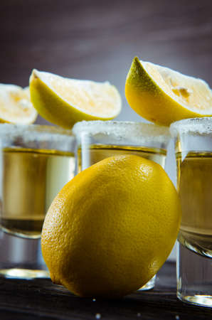 Tequila drink served in glasses with lime and saltの写真素材