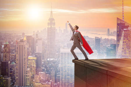 Businessman superhero successful in career ladder conceptの写真素材