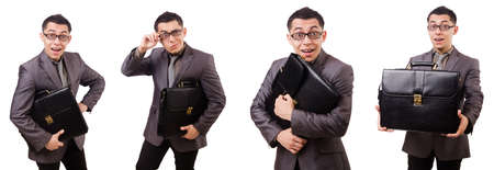 Young man holding briefcase isolated on whiteの写真素材