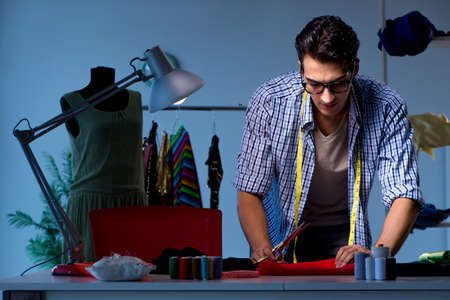Male tailor working in sewer shopの写真素材