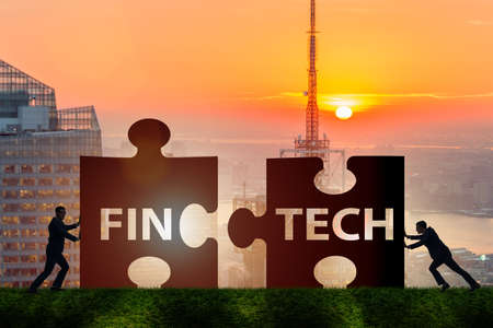 Fintech financial technology concept with puzzle piecesの写真素材