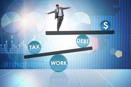 Businessman in debt and tax business conceptの写真素材