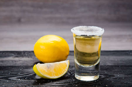 Tequila drink served in glasses with lime and saltの写真素材