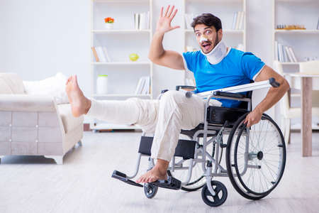 Injured young man recovering at homeの写真素材