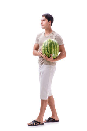 Young man with watermelon isolated on whiteの写真素材