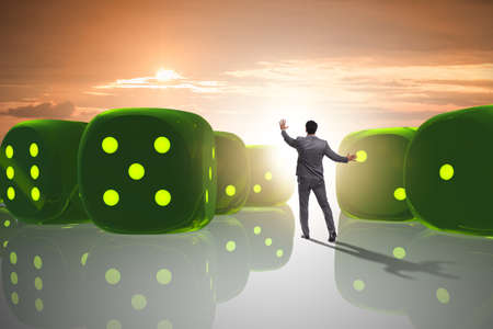 Businessman thinking about chances of business successの写真素材