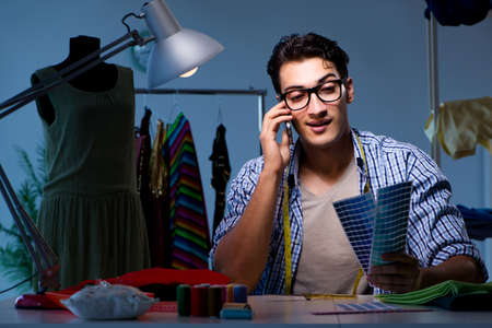 Male tailor working in sewer shop