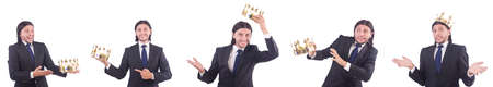 Businessman with crown isolated on whiteの写真素材