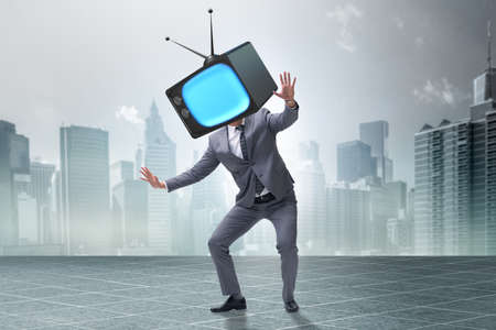 Media zombie concept with man and tv set instead of head