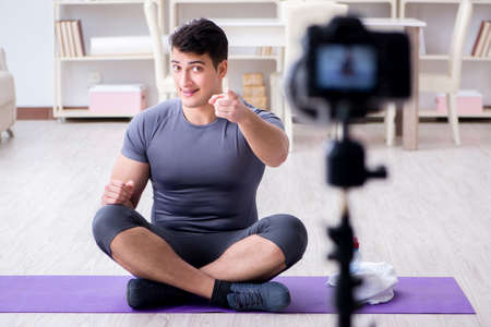 Sports and health blogger recording video in sport concept