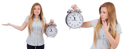 Young woman with clock on whiteの写真素材