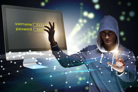 Hooded hacker in data computer security concept
