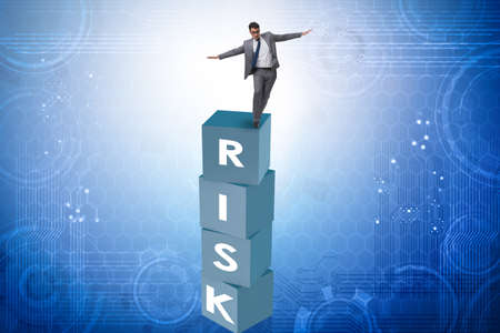 Businessman in risk and reward business conceptの写真素材