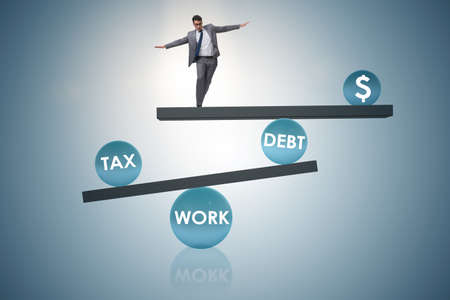 Businessman in debt and tax business conceptの写真素材