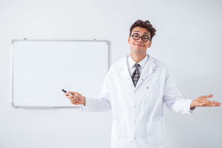 Funny doctor scientist making presentation in hospitalの写真素材