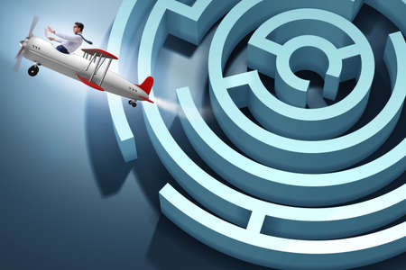 Businessman escaping from maze on airplaneの写真素材