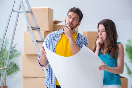 Young family planning home refurbishing in DIY concept