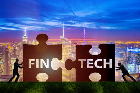 Fintech financial technology concept with puzzle piecesの写真素材