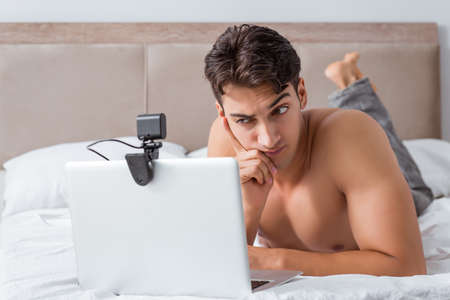 Young sexy man in online dating concept