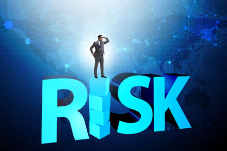 Businessman in risk and reward business concept
