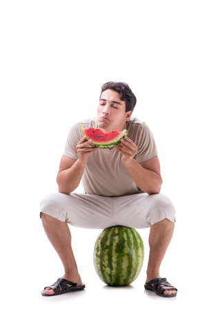 Young man with watermelon isolated on whiteの写真素材