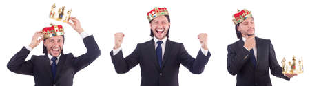 Businessman with crown isolated on whiteの写真素材