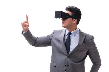 Businessman wearing virtual reality VR glasses isolated on whiteの写真素材