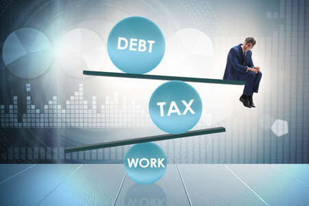 Businessman in debt and tax business conceptの写真素材