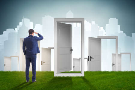 Businessman facing many business opportunitiesの写真素材