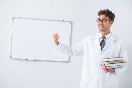 Funny doctor scientist making presentation in hospitalの写真素材