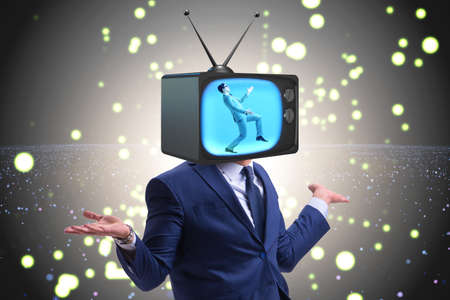 Man with television head in tv addiction conceptの写真素材