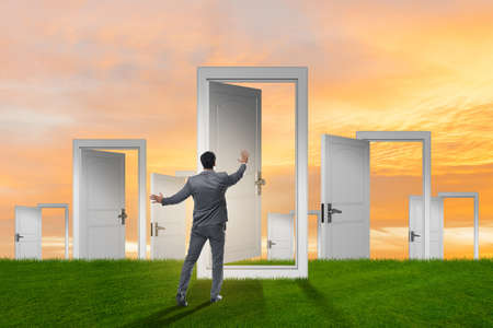 Businessman facing many business opportunitiesの写真素材