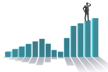Businessman looking far in economic forecasting concept