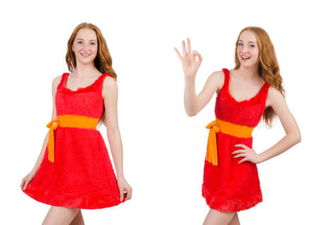 Pretty young girl in red dress isolated on white backgroundの写真素材