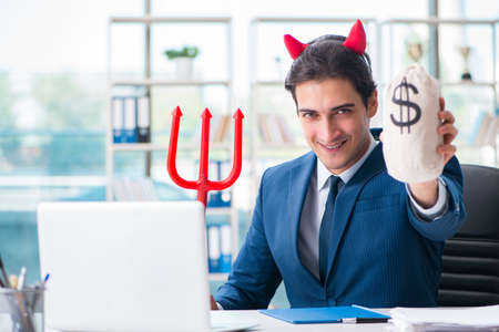 Devil angry businessman in the office