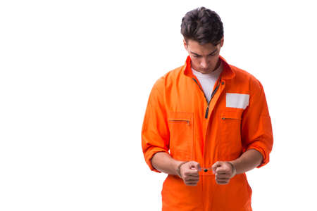 Handcuffed handsome businessman isolated on white backgroundの写真素材