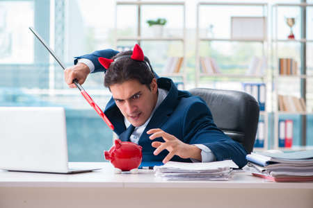 Devil angry businessman in the officeの写真素材