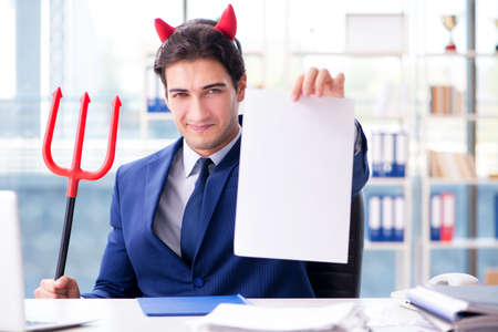 Devil angry businessman in the office