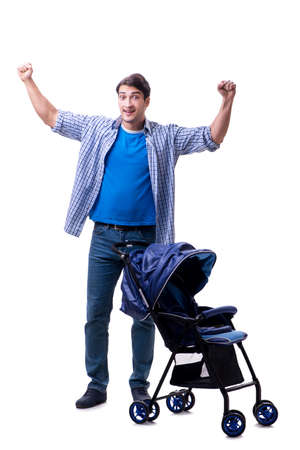 Young dad with baby pram isolated on whiteの写真素材