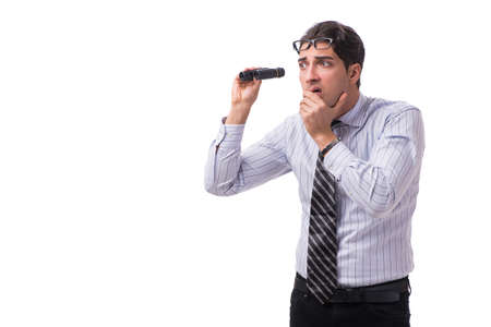 Young handsome businessman looking into future with binoculars