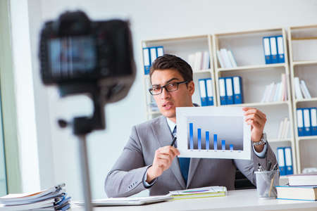 Business blogger doing webcast for his subscribers