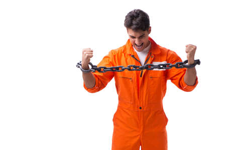Prisoner with his hands chained isolated on white backgroundの写真素材