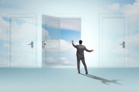 Businessman facing many business opportunitiesの写真素材