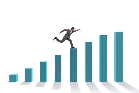 Businessman running towards economic successの写真素材