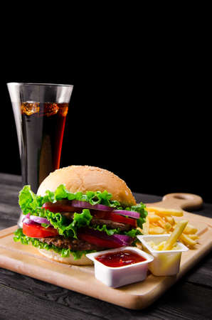 Burger served in bun in nutrition fast food conceptの写真素材