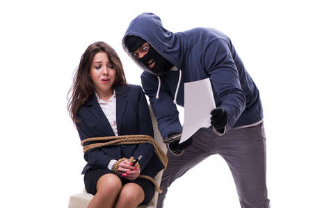 Gunman forcing a womanの写真素材