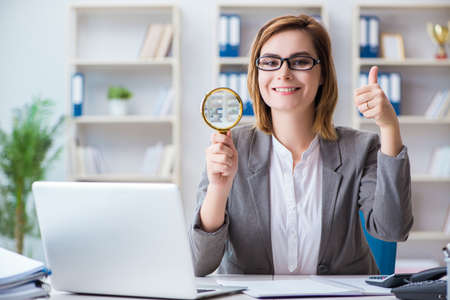 Businesswoman working in the officeの写真素材