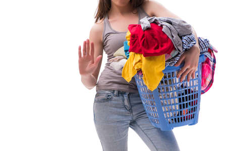Woman with basket of clothing for laundryの写真素材