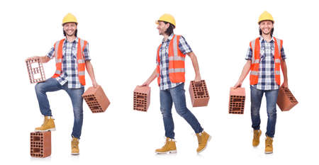 Builder with clay bricks isolated on whiteの写真素材