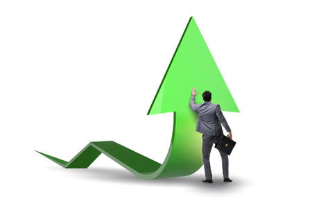Businessman supporting growtn in economy on chart graphの写真素材